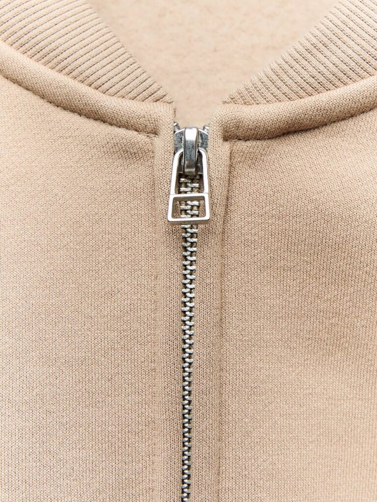 Beige sweater with zipper